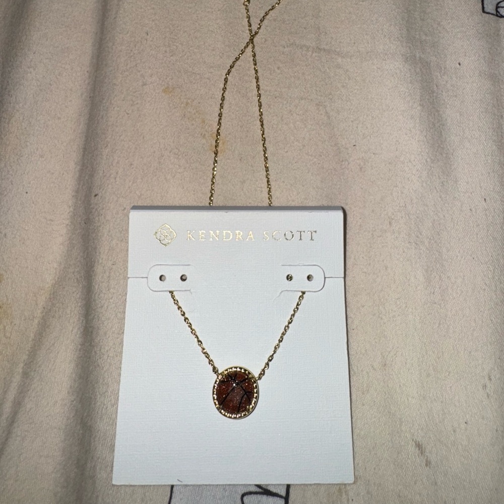 Kendra Scott Gold and Brown  Basketball Pendant Necklace